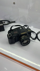 Vintage Canon T70 Film Camera With A Standard 50mm f/1.8 FD Lens