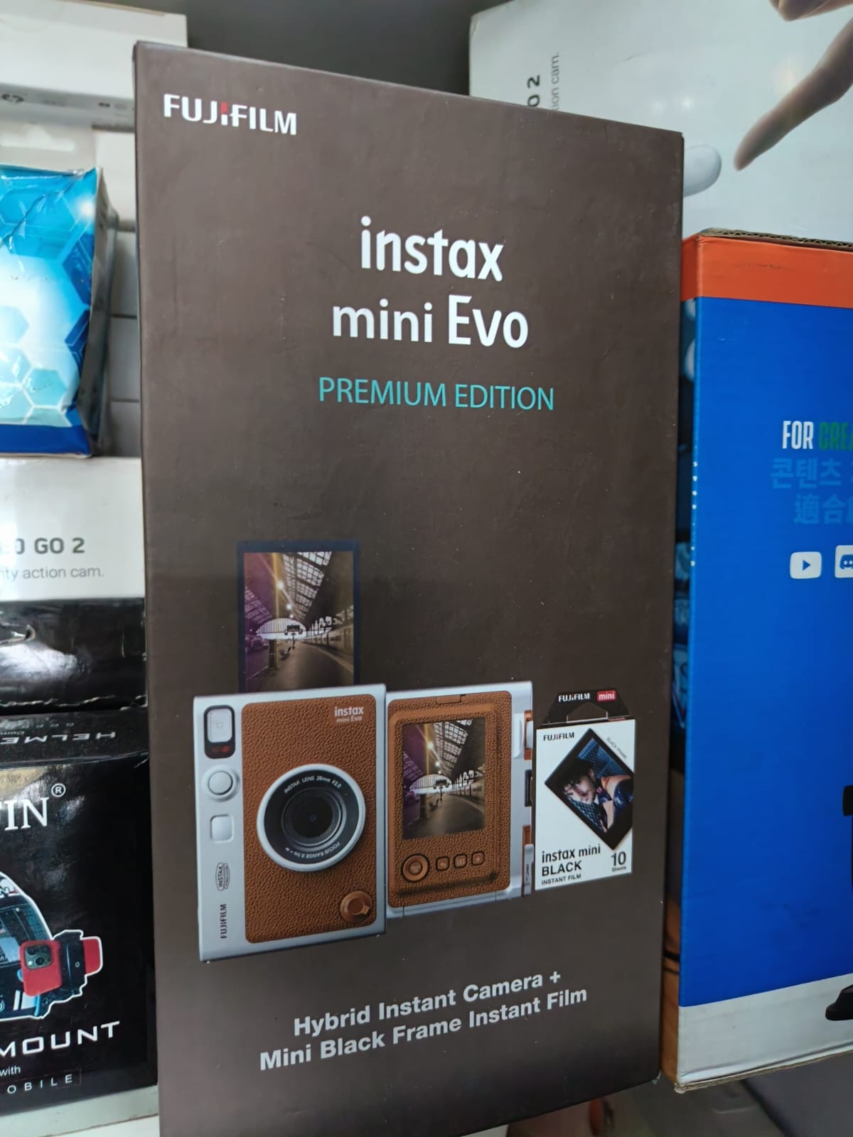 Open Box, Unused Fujifilm Instax Mini Evo Hybrid Camera Premium Edition with 20 Shots of Instax Mini Black Film and 100 Different Expressions Brown