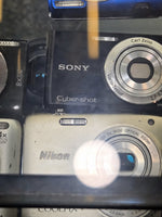 Load image into Gallery viewer, Vintage Sony Cyber-shot DSC-W320 black and Nikon COOLPIX S3100 silver cameras in supplied display photo
