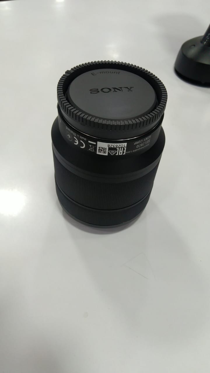 Used Sony sel28 70 Lens with Hood