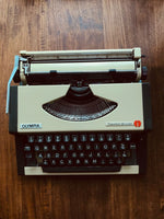 Load image into Gallery viewer, Vintage Typewriter Olympia Traveller De Luxe
